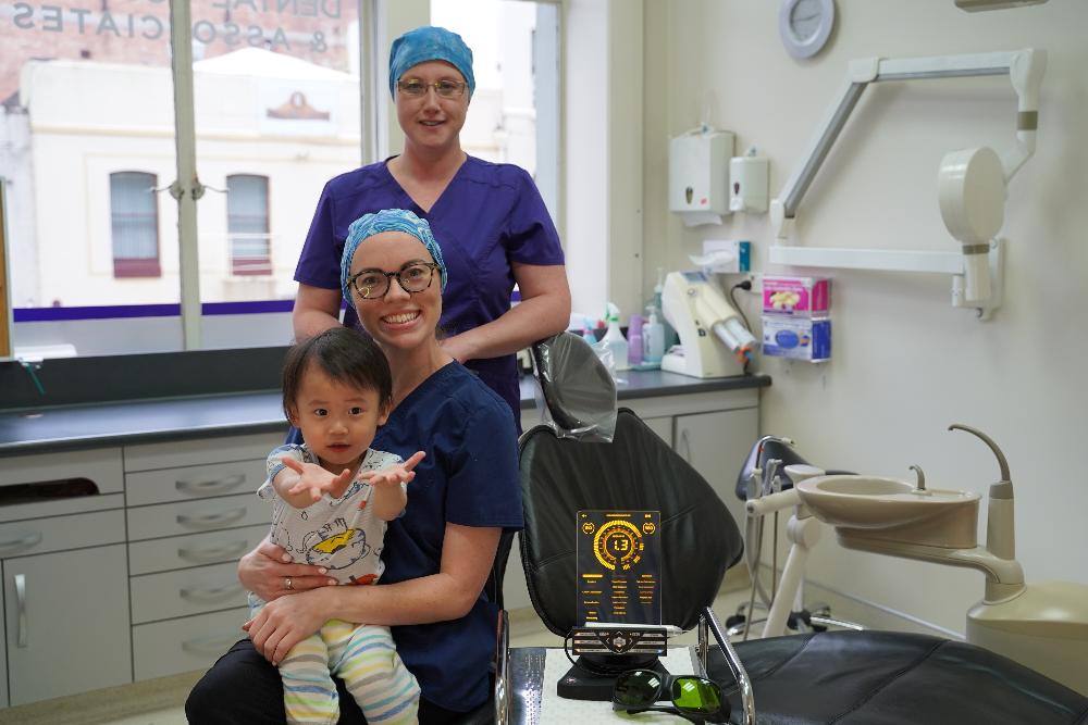 Dunedin dentists with young child after tongue tie release