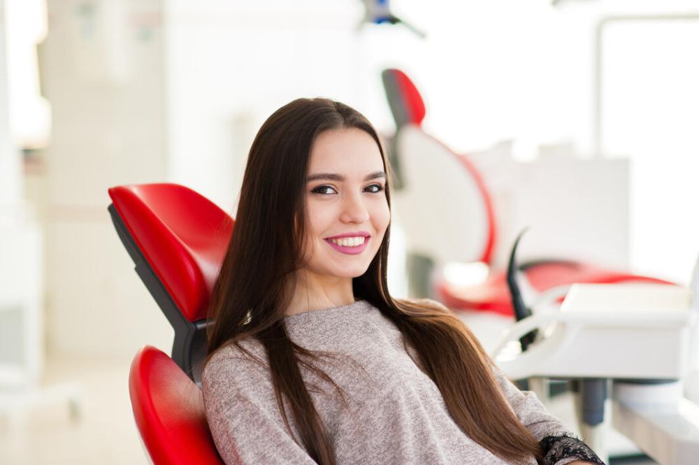 woman smiling after root canal treatment in dunedin