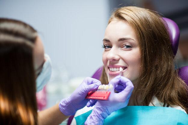woman getting teeth whitened in Dunedin