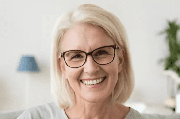 woman smiling after cosmetic injectables in dunedin