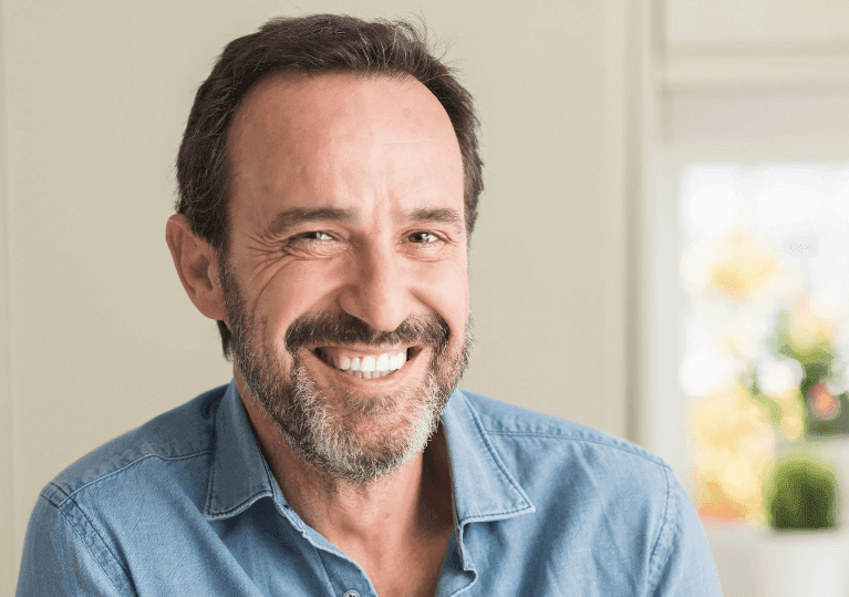 tmd treatment dunedin | man smiling after treatment
