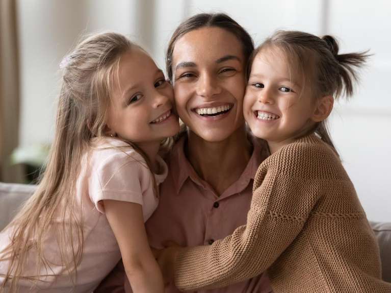 childrens dentist dunedin | family smiling