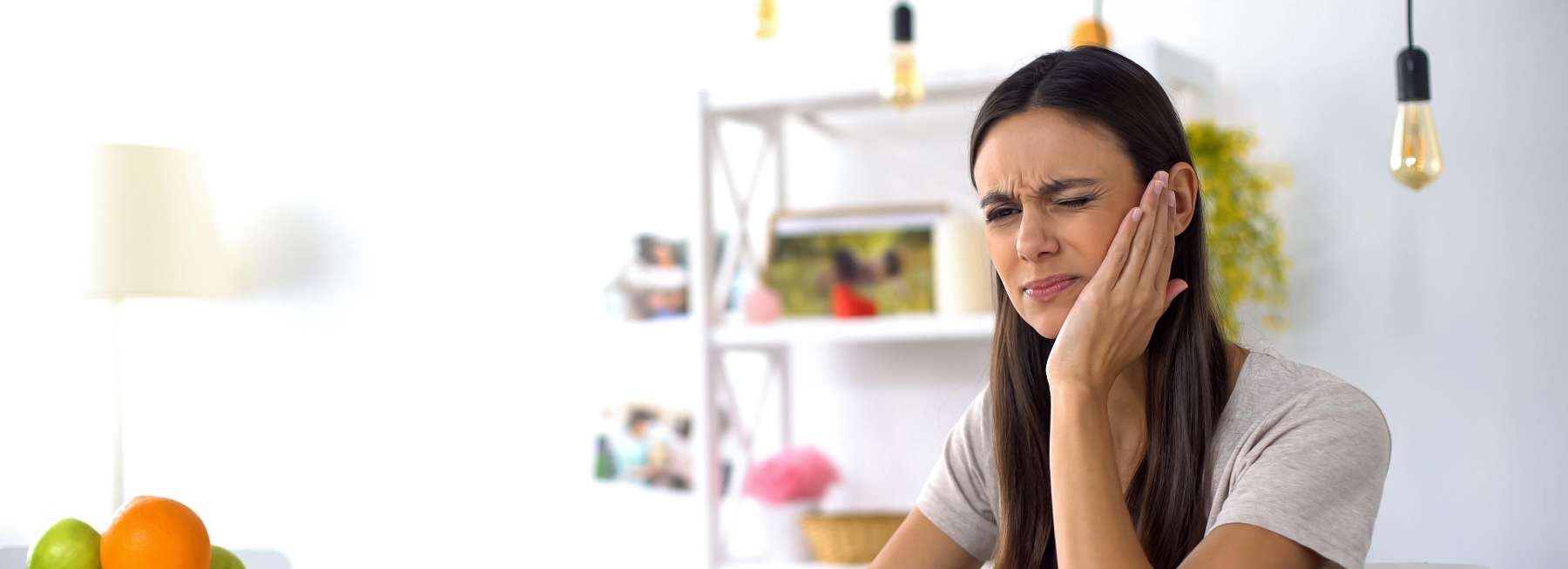 tmd treatment dunedin | woman with jaw pain